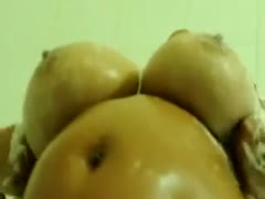 My large, attractive, elderly housewife's wet, large breasts in the shower